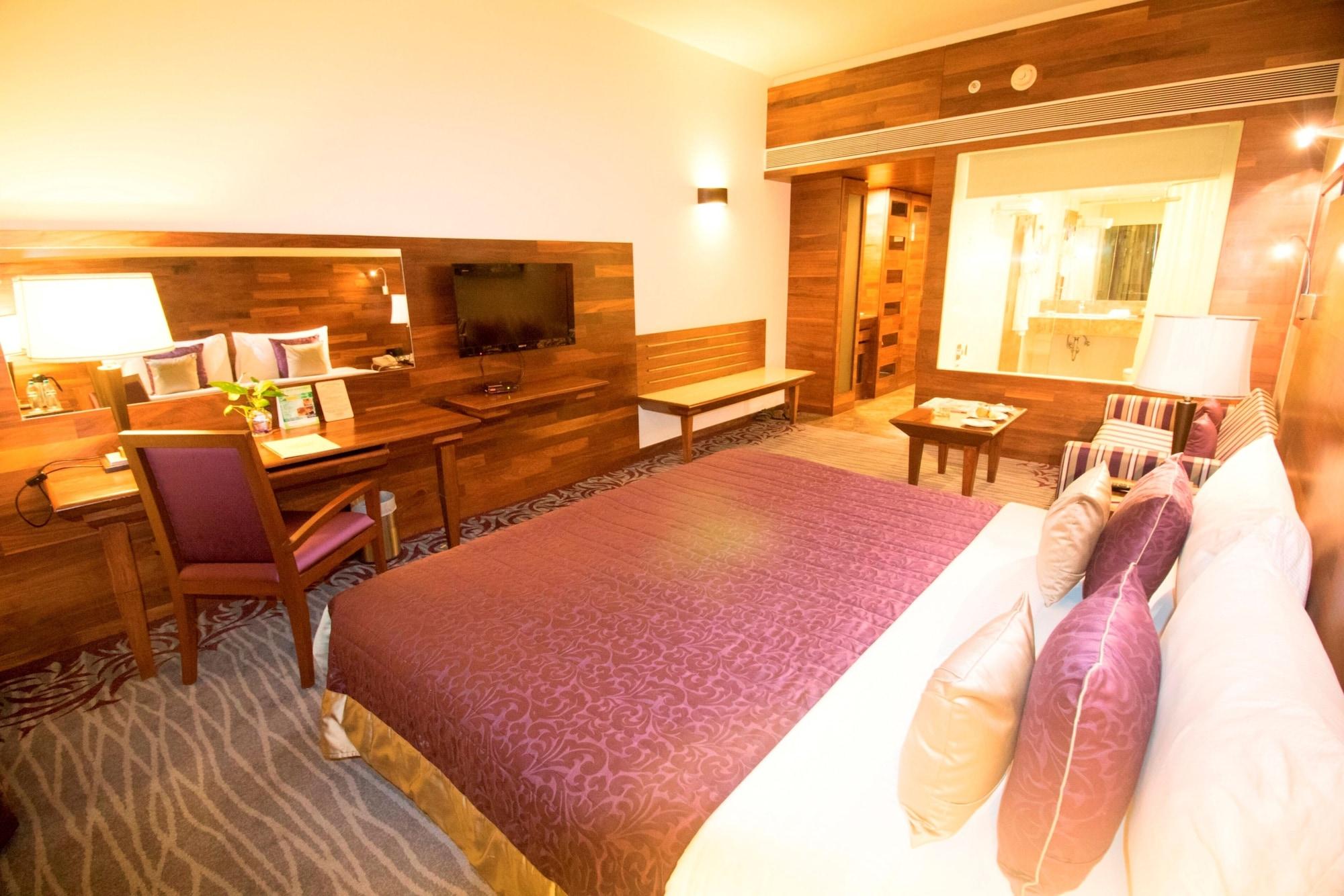 The Orchid Hotel Hinjewadi Pune Bagian luar foto A room at the hotel