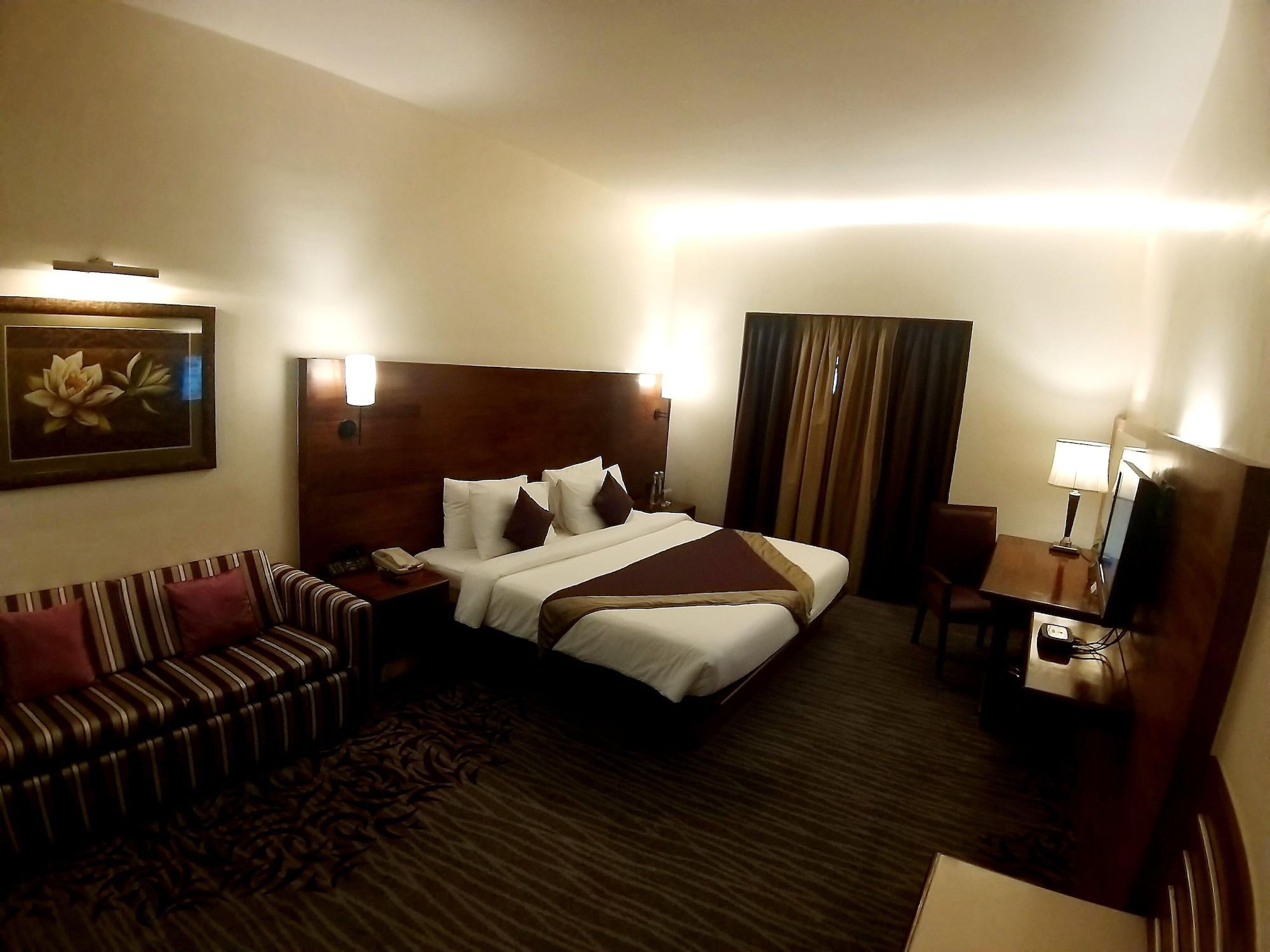 The Orchid Hotel Hinjewadi Pune Bagian luar foto A room at the hotel