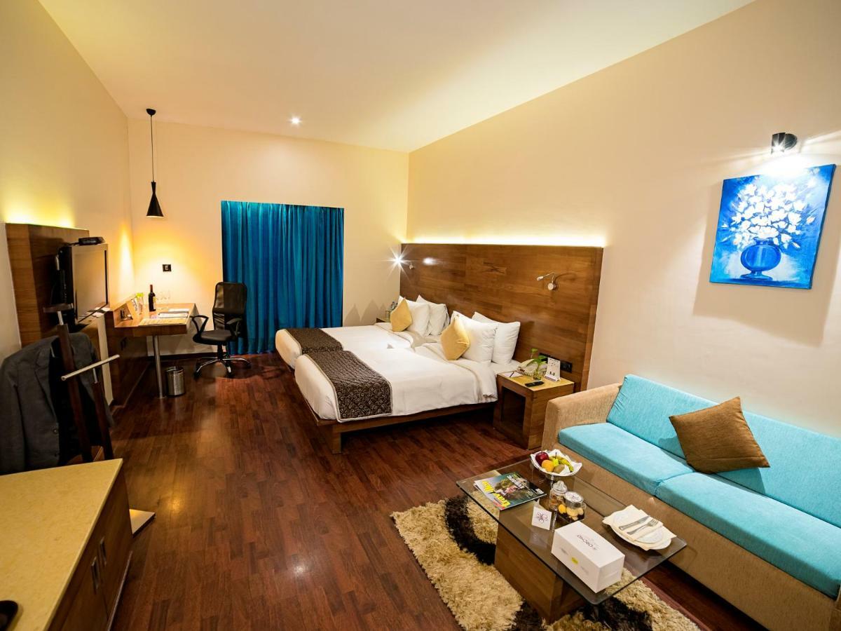 The Orchid Hotel Hinjewadi Pune Bagian luar foto A room at the hotel
