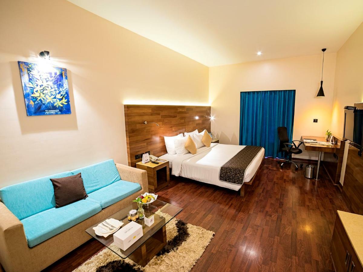 The Orchid Hotel Hinjewadi Pune Bagian luar foto A room at the hotel